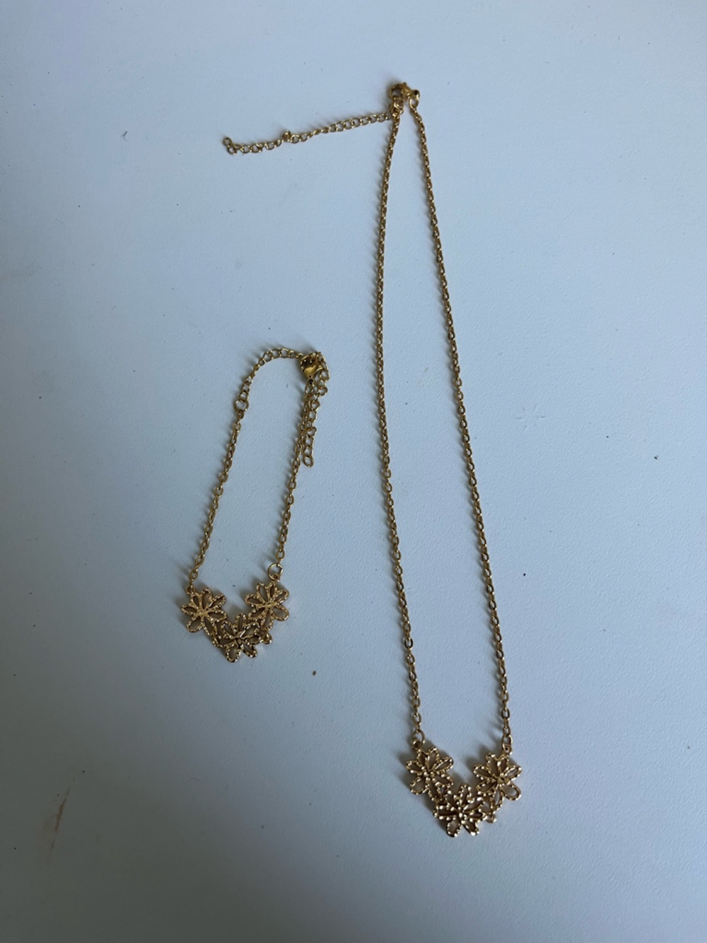 Delicate Gold Floral Necklace and Bracelet Set